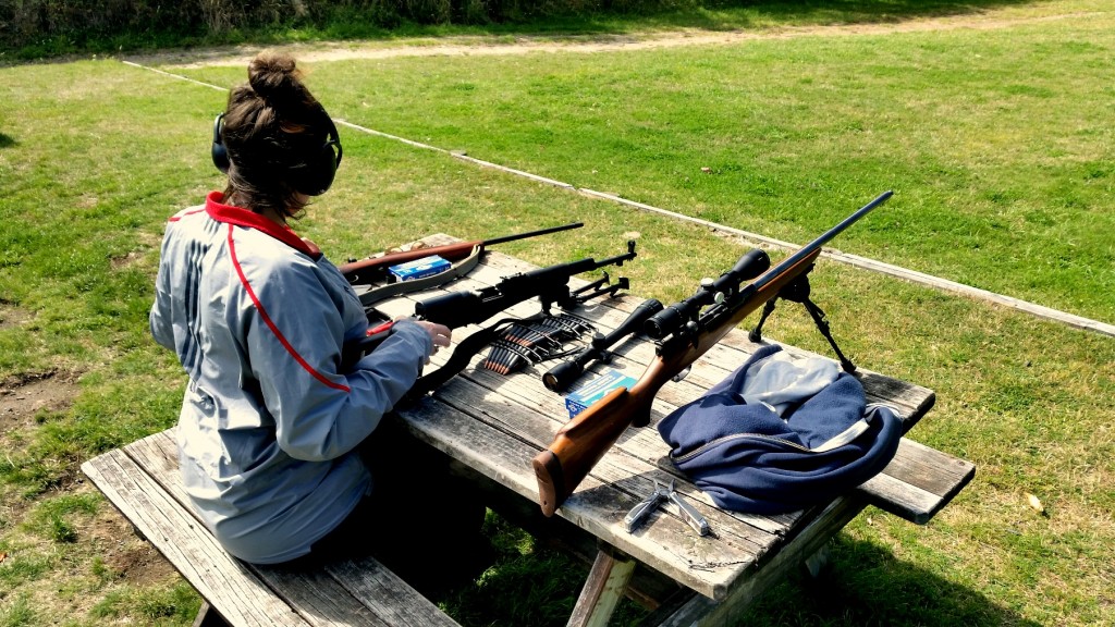 My wife with .303, SKS and M38 at Taupo NZDA.