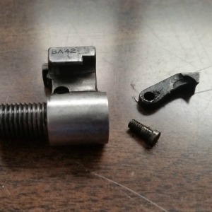 .303 bolt face, extractor claw and screw.