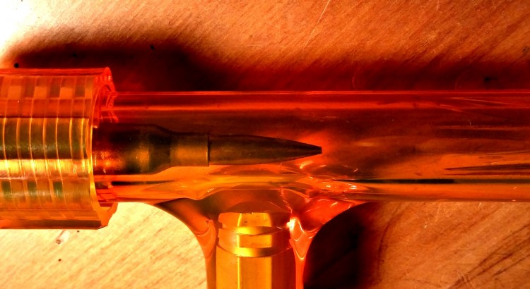Lyman bullet puller with 6.5x55 round in large collet.