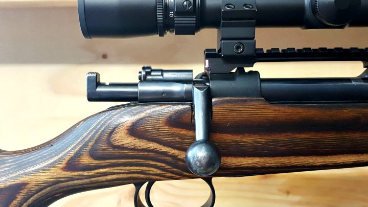 After checking the rifle is unloaded, close the bolt fully.